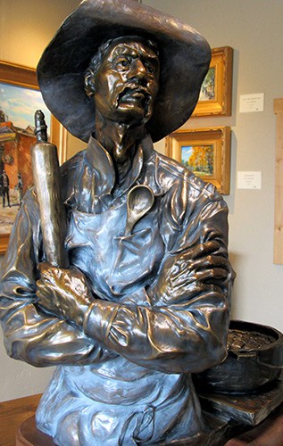 cowboy cook bronze sculpture